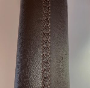 Hand stitched leather handrail