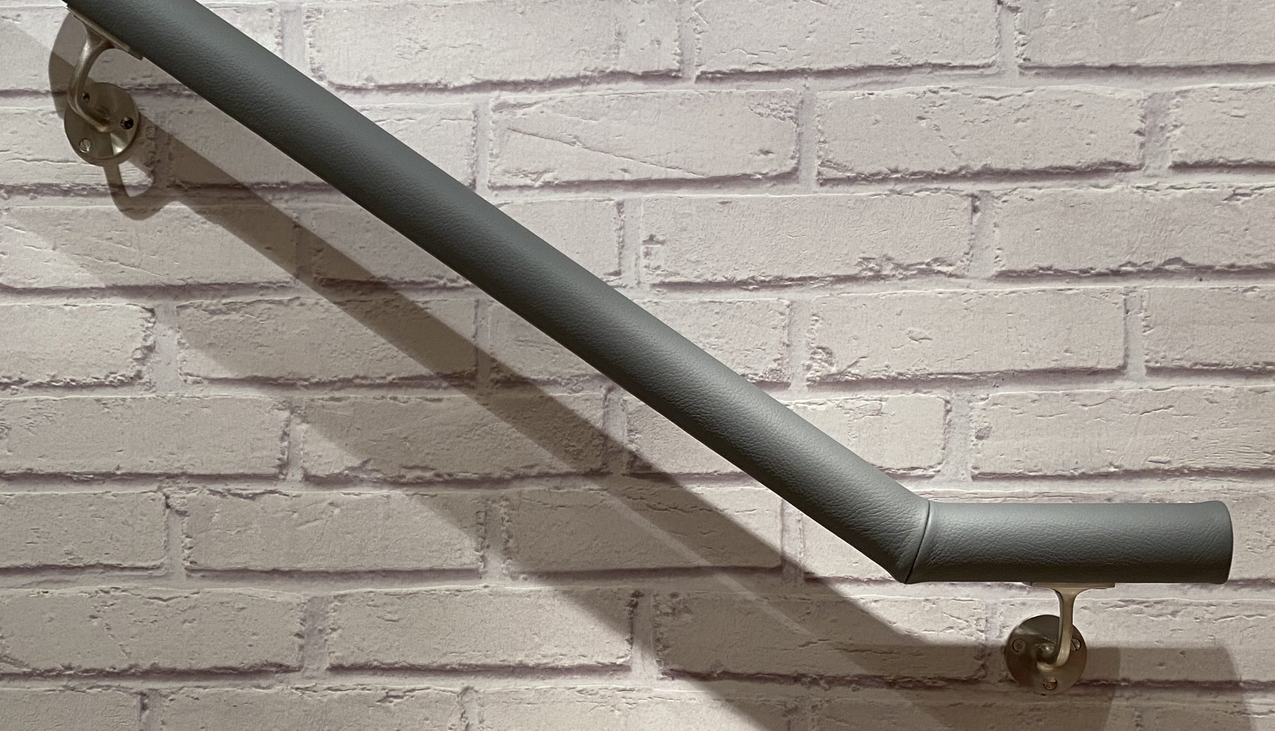 dark grey leather handrail
