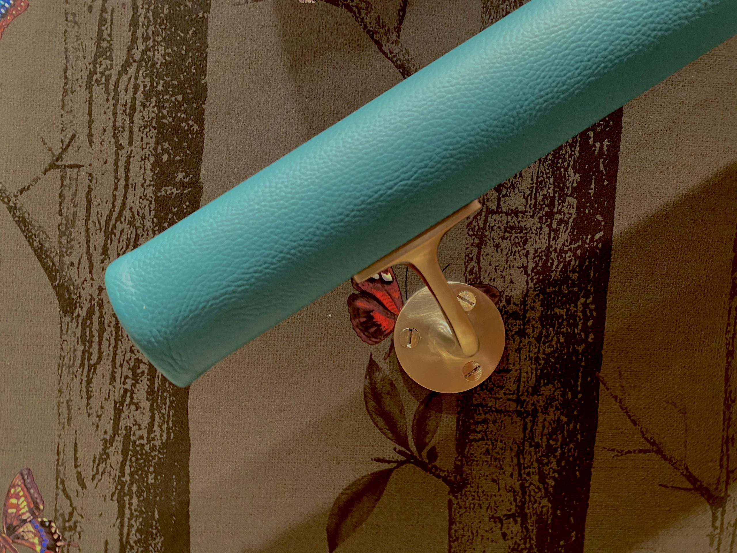turquoise leather handrail